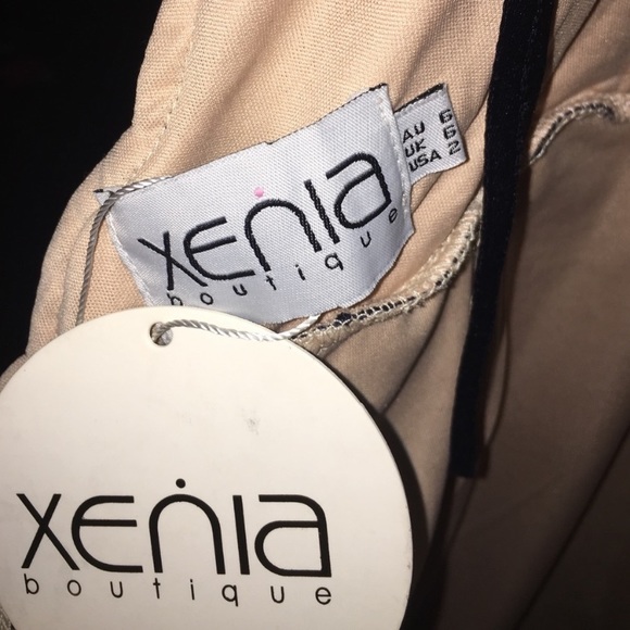 Halter Mini with Low Cut back. Never worn w/ Tags - Picture 3 of 3